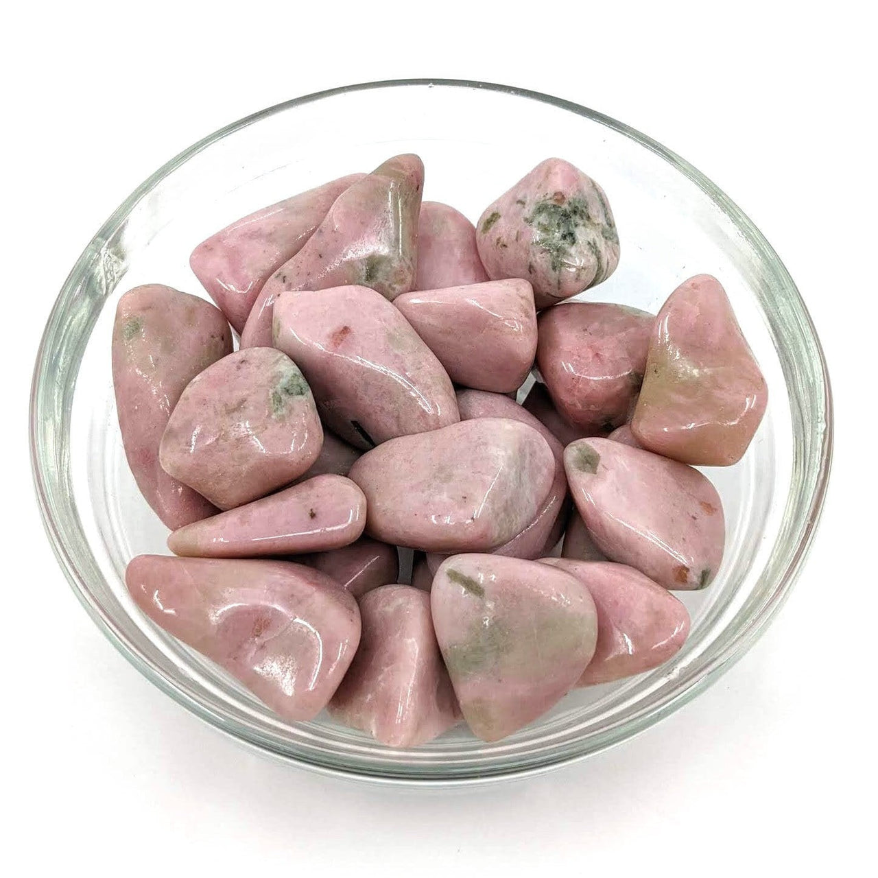 A bowl filled with beautiful clinozoisite tumbled stones, perfect for selection