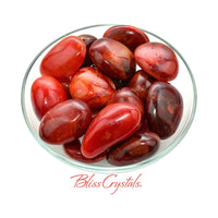 Thumbnail for Small Carnelian Pebble Palm Stone with red glass heart-shaped candies for positive energy