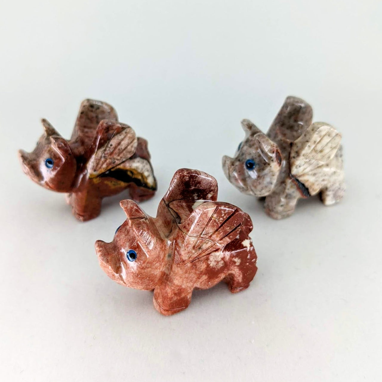 Decorative glass squirrels with copper and silver tones, part of 1 Soapstone Baby Animal Carving