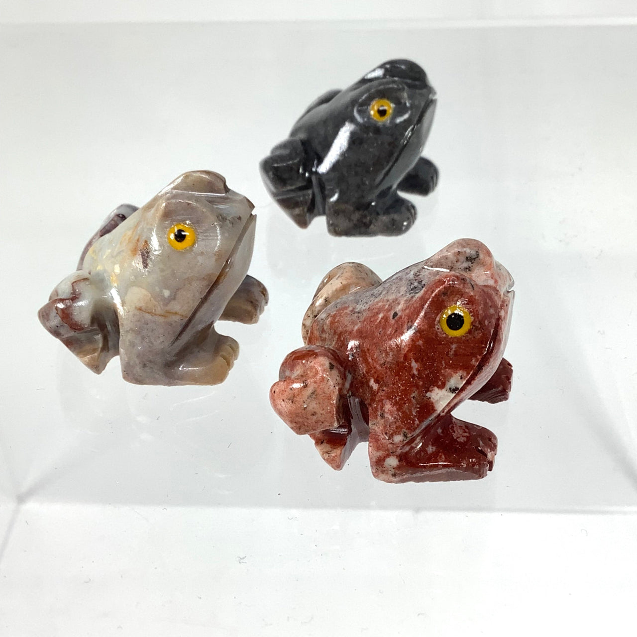 1 Soapstone Baby Animal Carving #C005D featuring fish figurines in glass from Peru