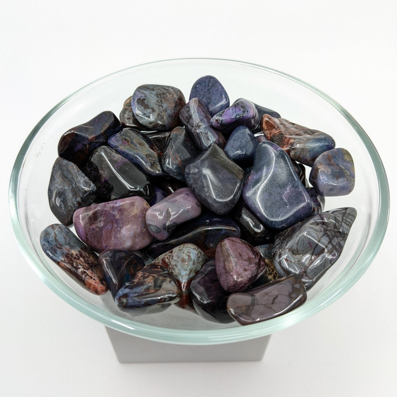 A bowl of purple and blue tumbled stones - 1 Sugilite Mixed Tumbled Stone #LV1252