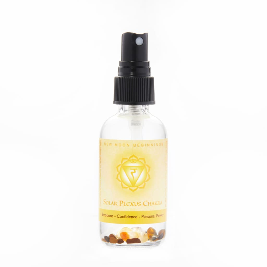 A bottle of Sun Peace Oil with almonds from the 7 Chakra Balancing Spray, Essential Oil and Crystal Perfume