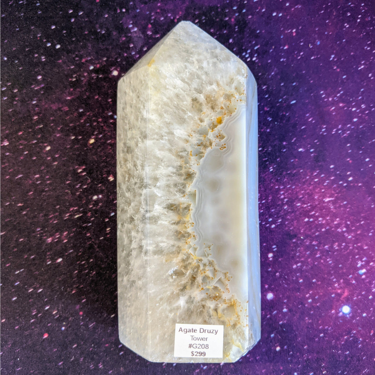 Large quartz point with gold leaf displayed in Agate Druzy Tower product #G208