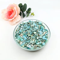 Thumbnail for Bowl of amazonite gravel mini chips next to a rose, 28g parcel (.25-.75’) #LV3082