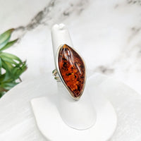 Thumbnail for Amber Adj. 7-9 Ring #LV4466 with a striking large orange stone in the center