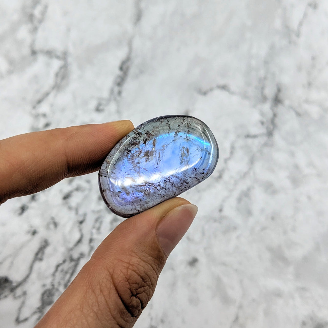 Hand holding Amethyst Rainbow Aura Quartz Palm Stone #LV2018, perfect for healing energy