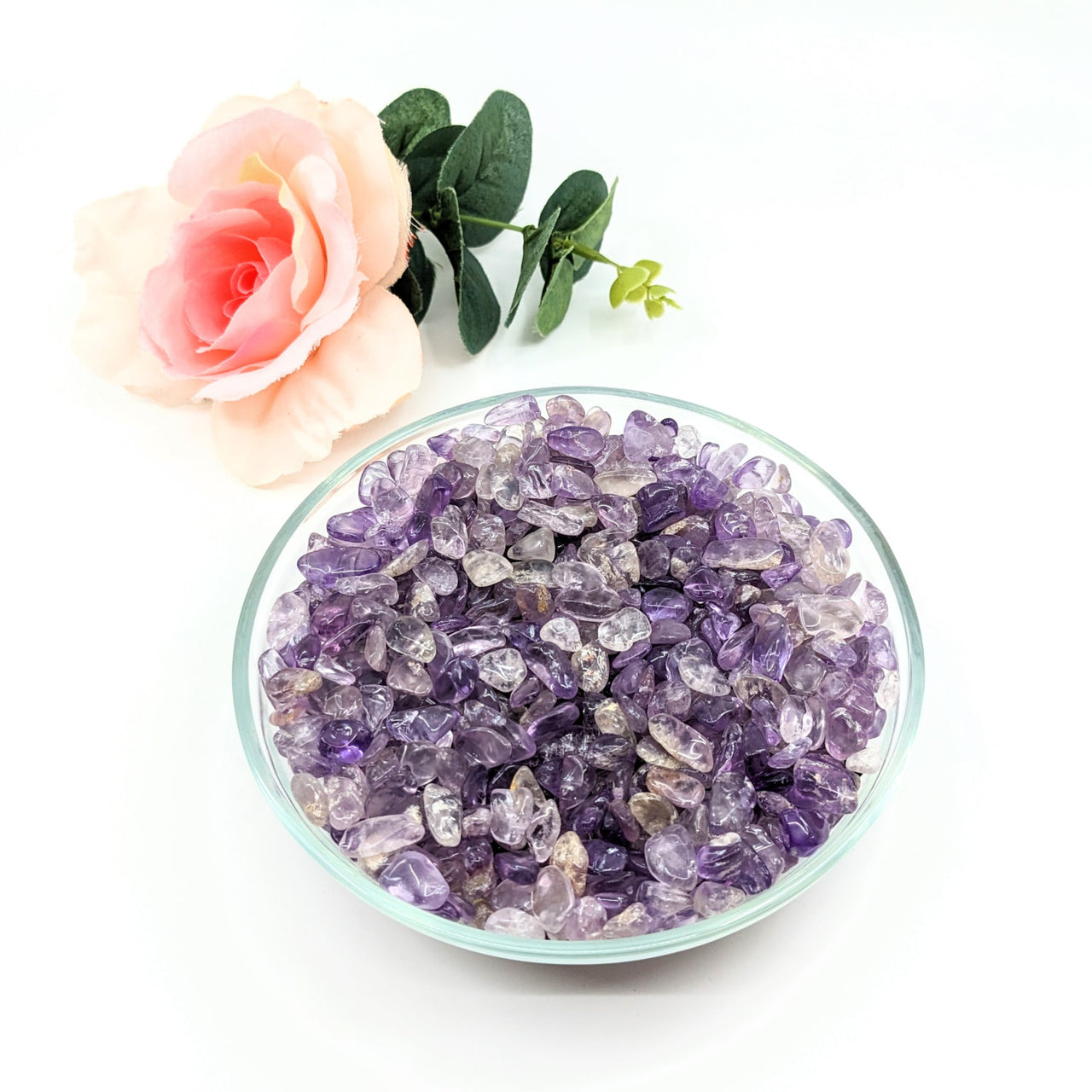 Amethyst crystals bowl and rose displayed in Amethyst Brazilian Gravel Mini Chips 28g Parcel