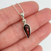 Thumbnail for Ammolite 18’ sterling silver pendant #SK8914 held with a red garnet necklace