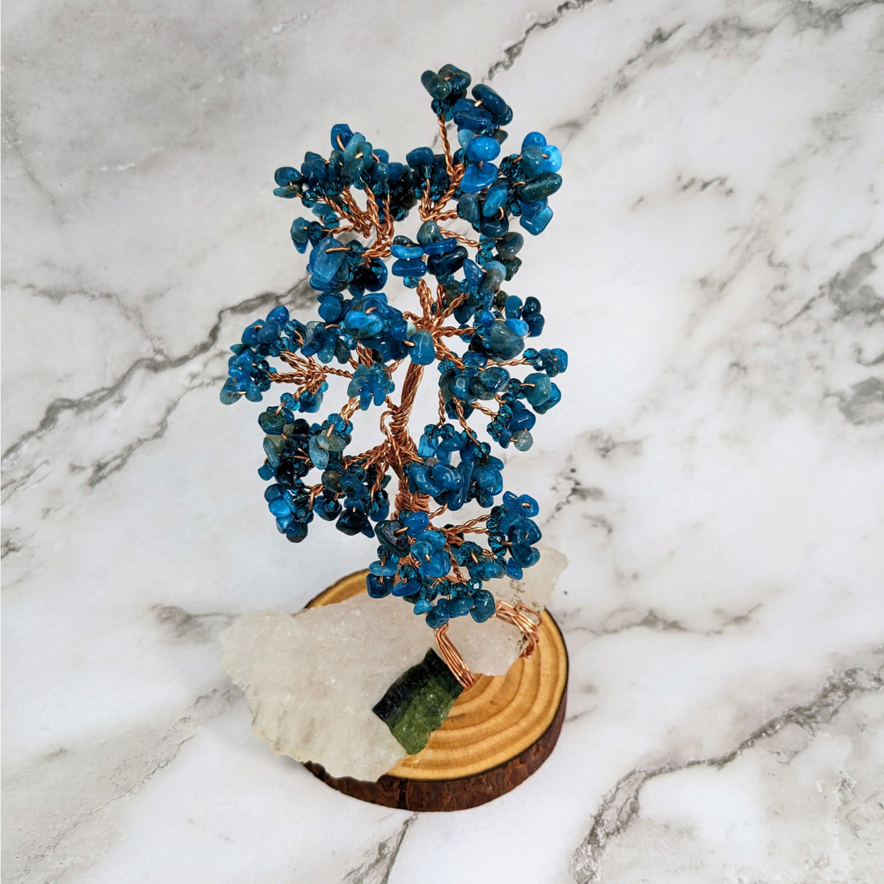 Apatite XL 6.5’ Gem Tree on Tourmaline #LV4106 featuring a blue flower on a marble base