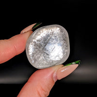 Thumbnail for Person holding large piece of ice from Apophyllite Gem A+ Tumbled #LV3847