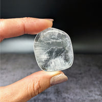 Thumbnail for Person holding ice-like Apophyllite Gem A+ tumbled stones #LV3891