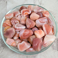 Thumbnail for A bowl of pink and white marble Apricot Agate Tumbled Stones #LV2261