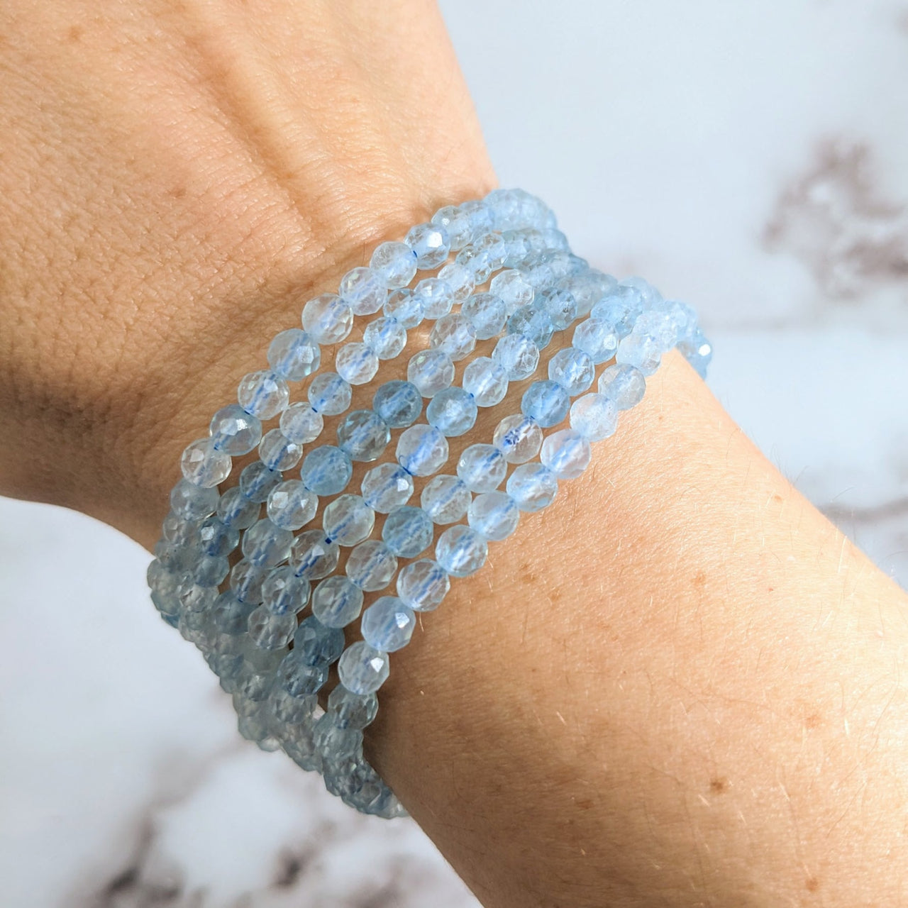 Aquamarine blue crystal stretch bracelet in 7-inch faceted 4mm design, product #LV1926