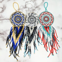 Thumbnail for Beaded Guatemalan 9’ Dreamcatcher #LV2658 on marble surface with three intricate designs