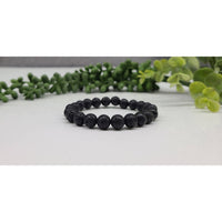 Thumbnail for Close-up of Black Lava Rock Beaded Bracelet on Table | Product #LV5331