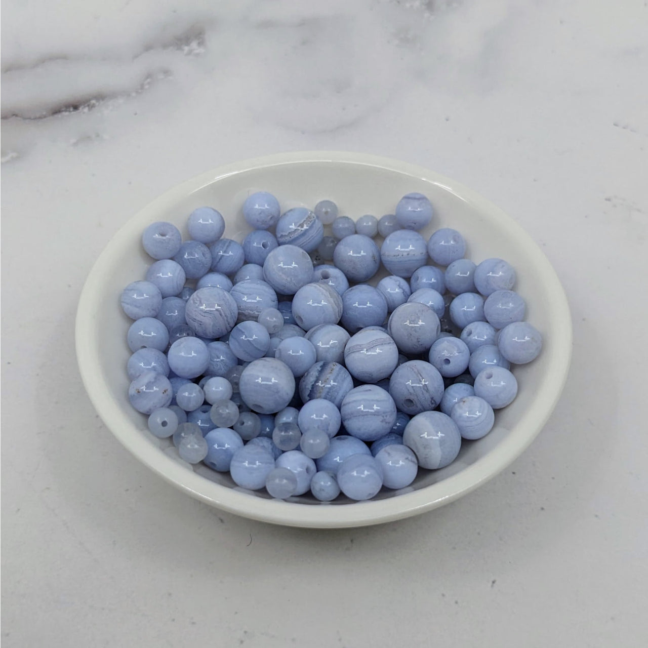 Blueberries in a bowl with Blue Lace Agate Round Bead Assorted Size 12 Pack #LV3656