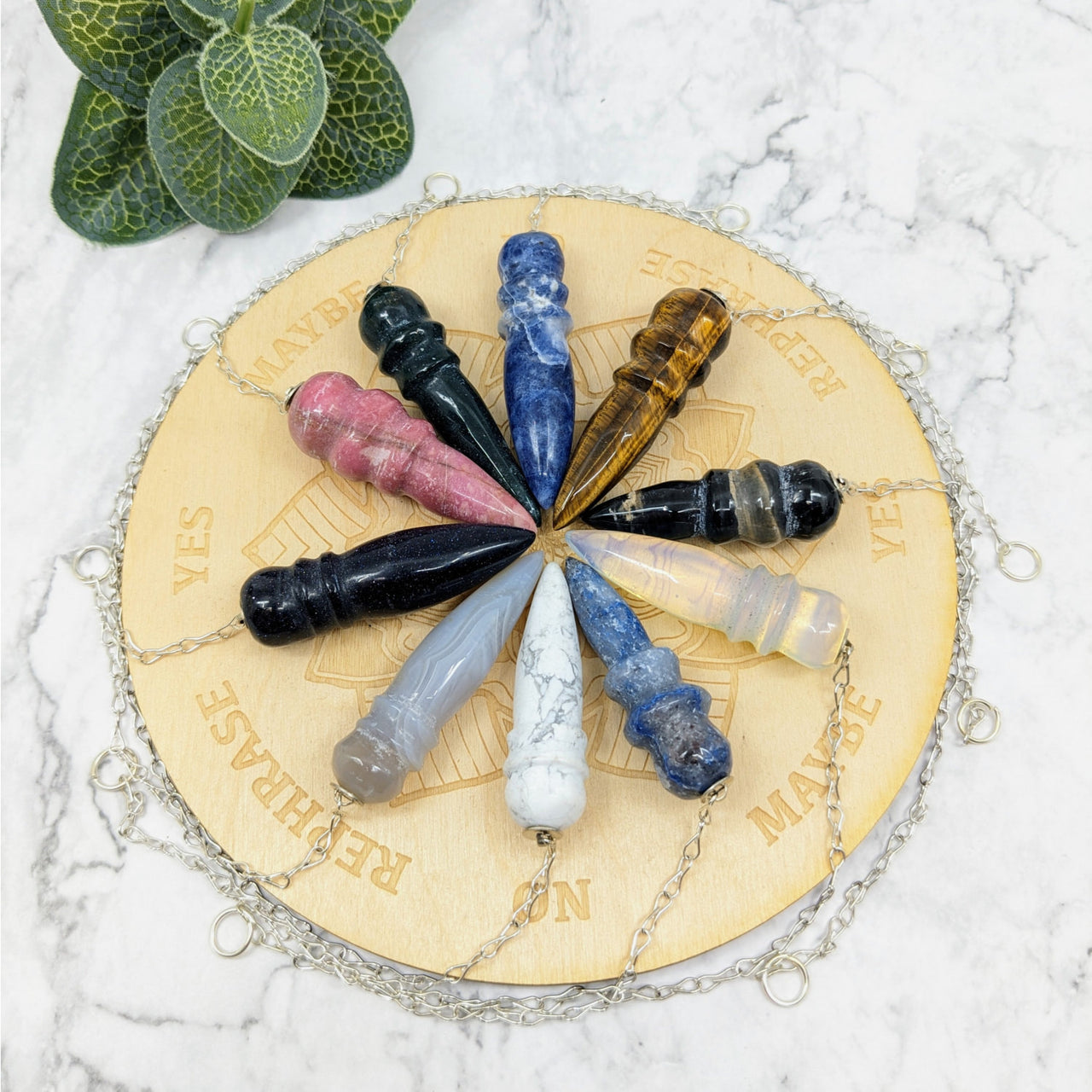 Marble pendulum with seven chakras on ’Carved Pendulum 1.5-2’ Choose Stone #LV5703.’