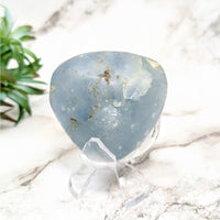 Thumbnail for Celestite 2.3’ Jumbo Polished Pebble #LV4539 with Clear Ribbon on Table