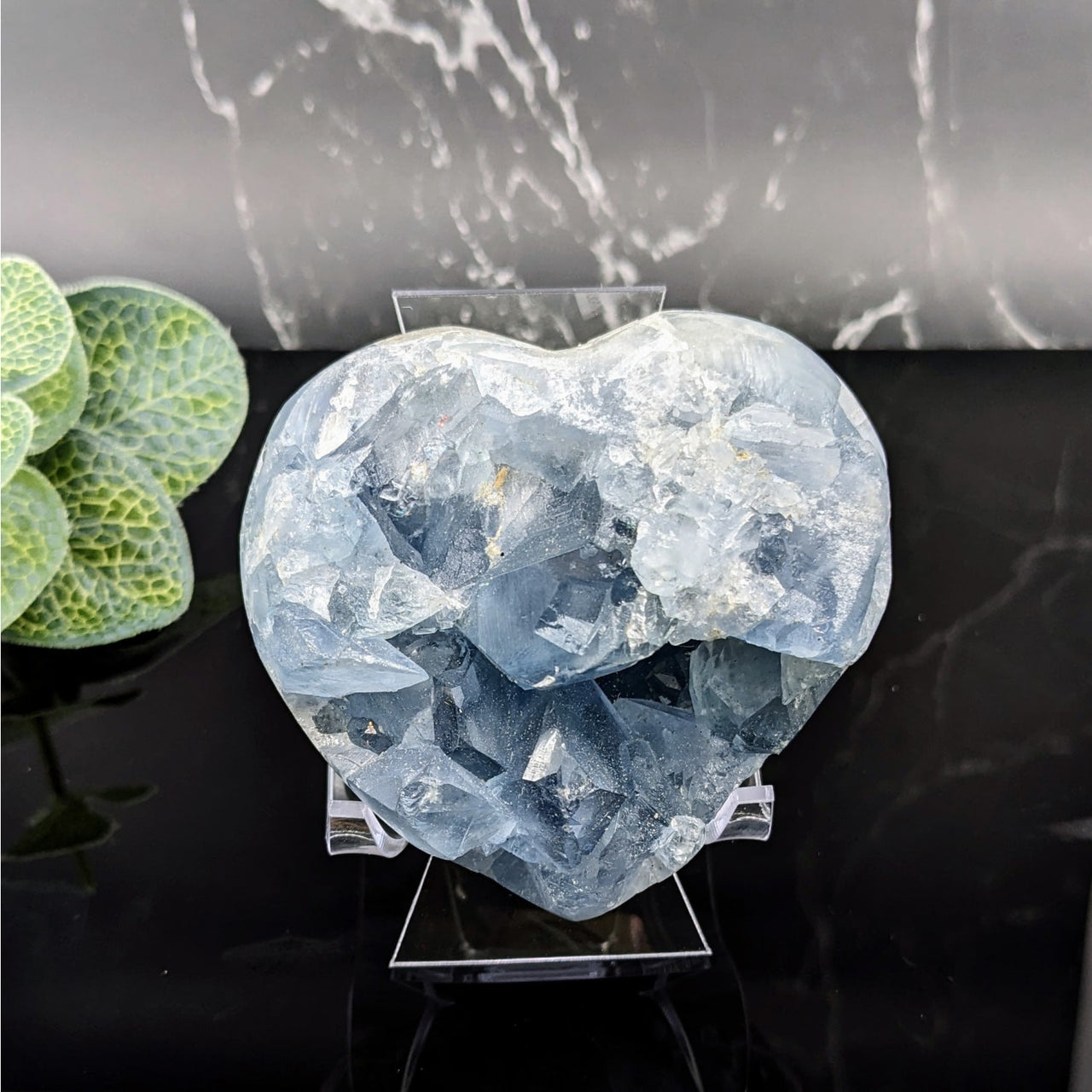 Heart-shaped ice sculpture with blue ice cube, product: Celestite 2.9’ Geode Heart #LV5712