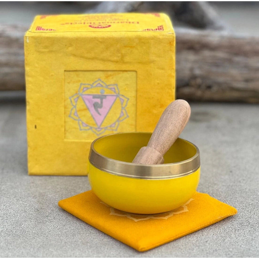 Yellow singing bowl with wooden spoon in Chakra Singing Bowl Box Set - Solar Plexus #LV3736