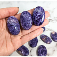 Thumbnail for Hand holding a Charoite Soapstone Palm Stone (17g) - #LV0810 with purple stone details