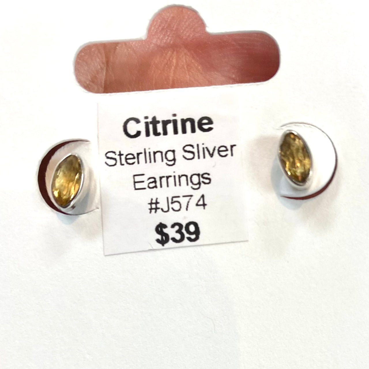 Close-up of hands holding Citrine Faceted Marquis Sterling Silver Earrings #J574