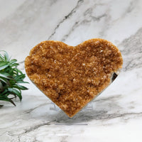 Thumbnail for Heart-shaped cookie on marble counter next to Citrine Geode 4.7’ Heart #LV4405