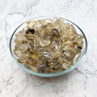 Thumbnail for A bowl of yellow quartz in a ’Citrine Natural Tumble Stones’ product from Bliss Crystals