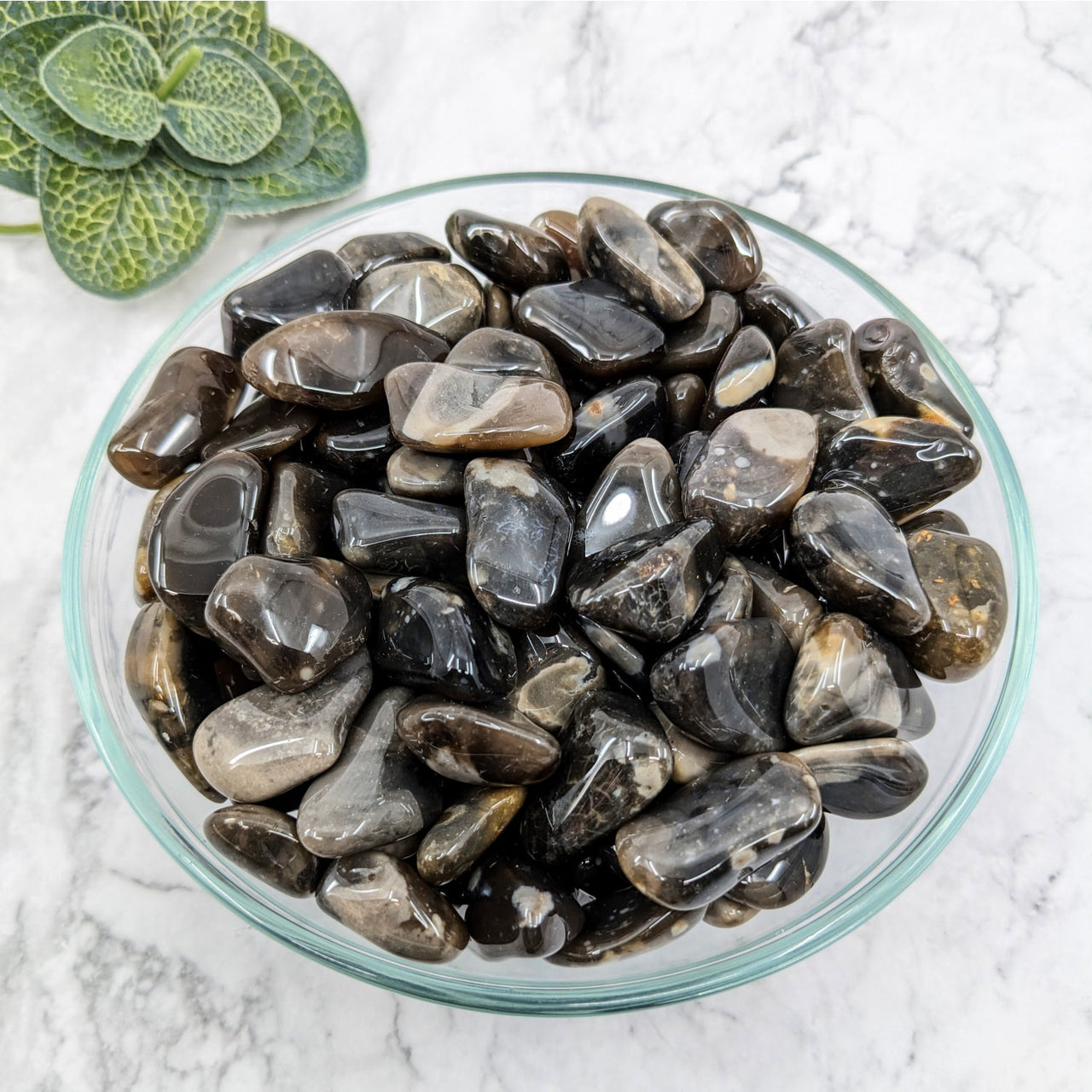 A bowl of black and white tumbled stones from Crop Circle Stone #LV5772, 0.8-1.3 inches