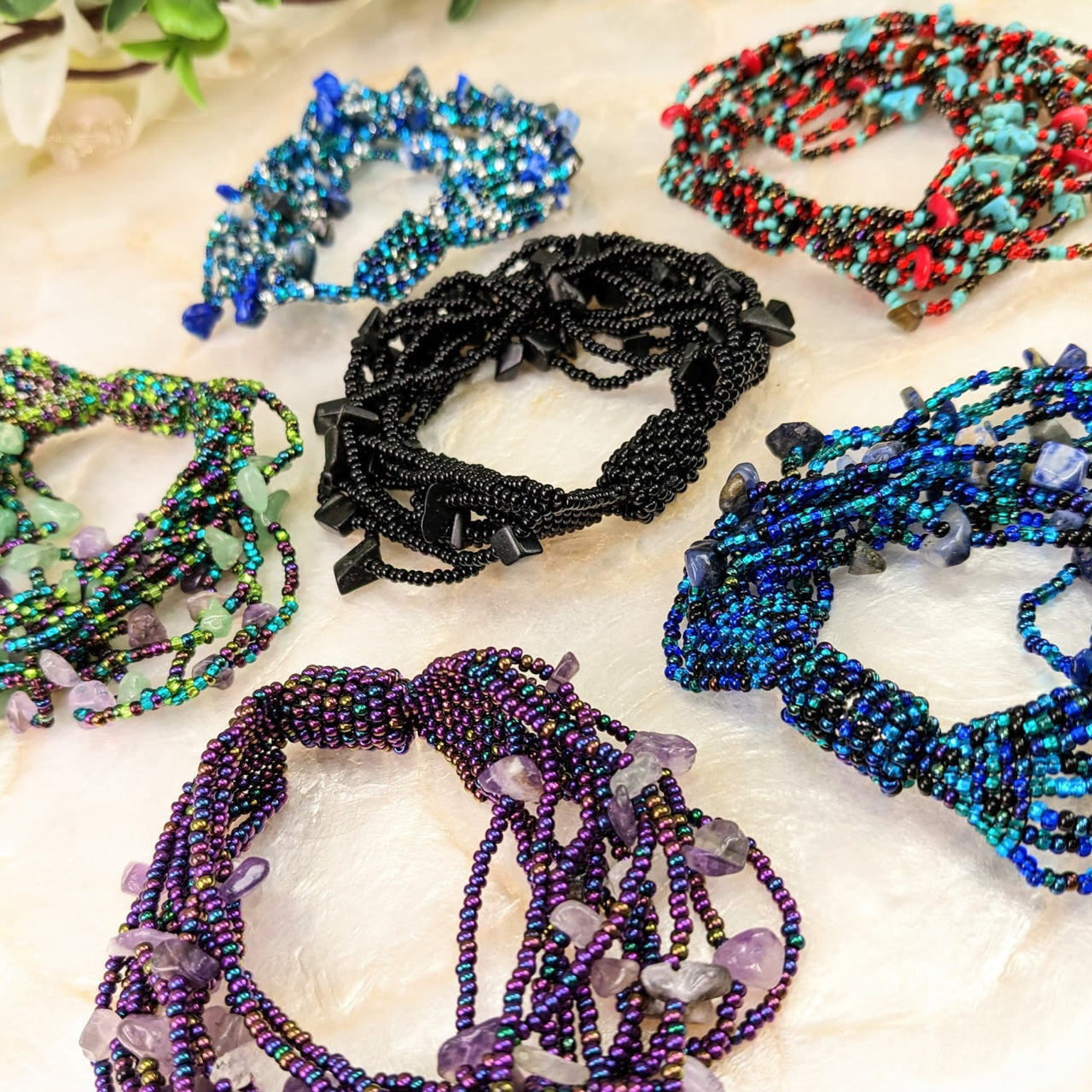 A selection of Crystal Beaded 12 Strand 8’ Bracelets w/ Magnet Clasp #LV1805