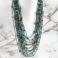 Thumbnail for Turquoise and bronze Crystal Beaded 30’ 12 Strand Necklace #LV2655 displayed elegantly