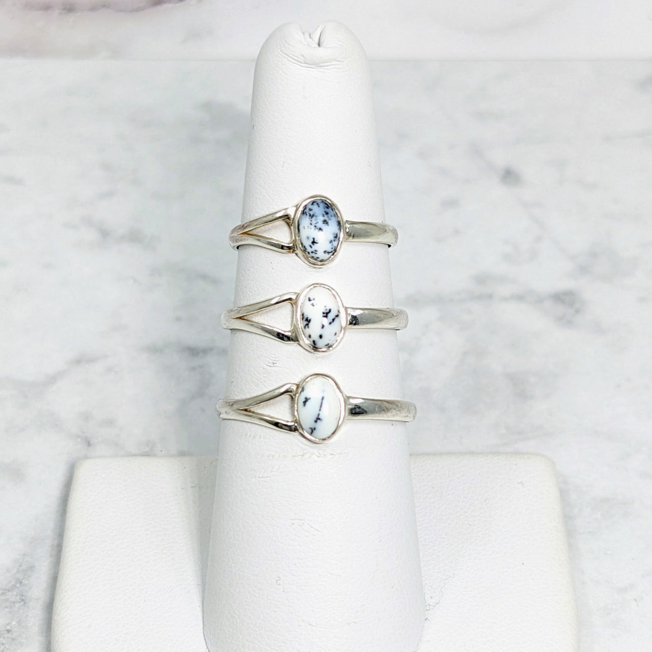 Stack of three rings with blue topaz stone in Dendrite Agate Dainty Ring Oval Sterling Silver #SK7993