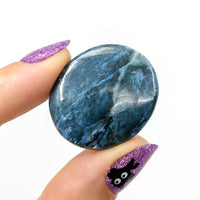 Thumbnail for Person holding Dianite Grade AA 1.2’ Cabochon marble ring, blue and purple #LV1235