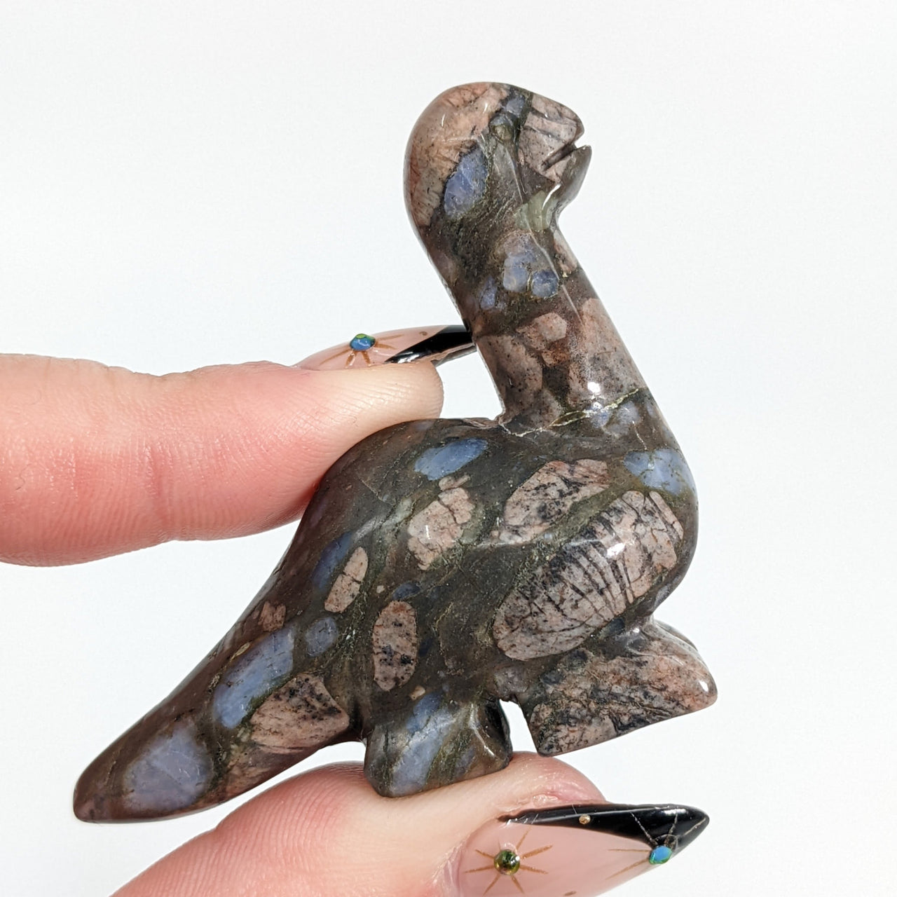 A small bird sculpture made of Larvikite rock, also known as blue pearl, Dinosaur Carving #LV1355