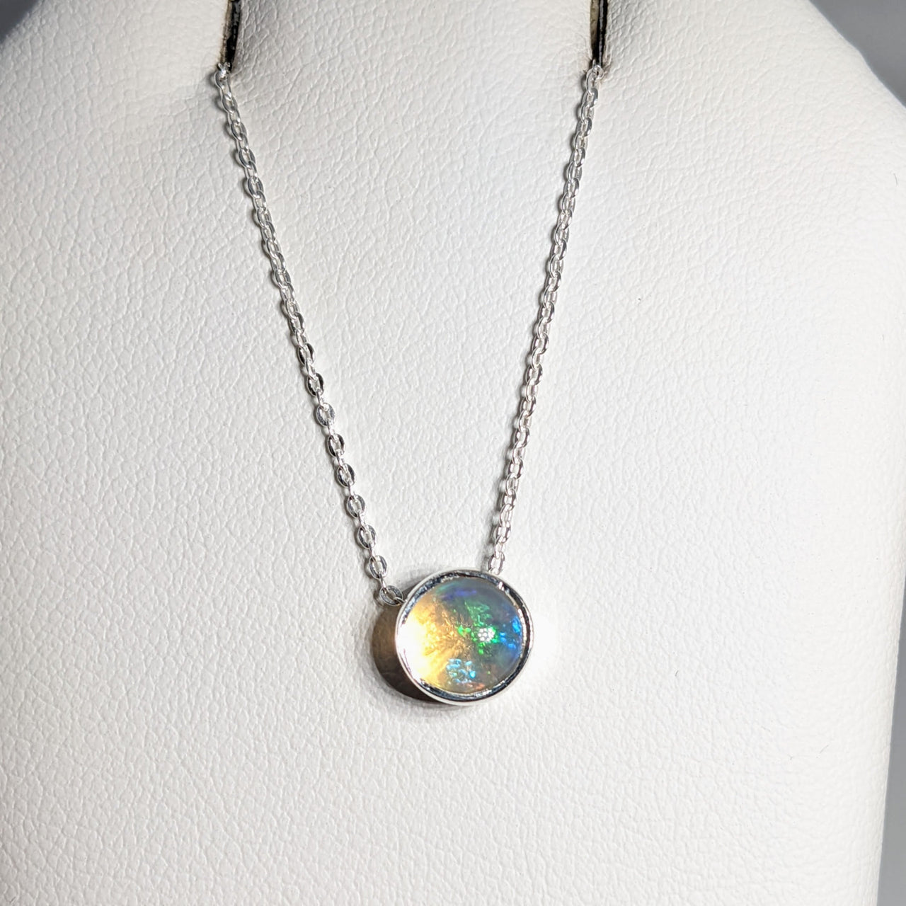 Sterling silver necklace with rainbow glass pendant on adjustable chain