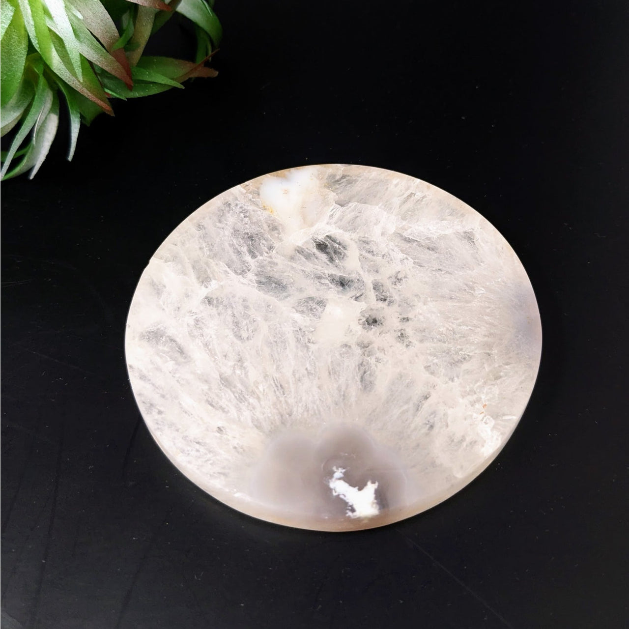 Flower Agate 3.4’ Coaster Plate #LV4423 on a white marble bowl with a black background