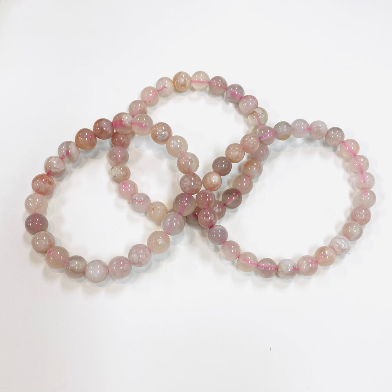 A set of three pink and white jade beads from the Flower Agate Bracelet #SK7553