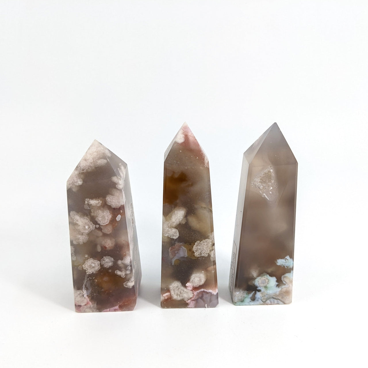 Three unique quartz stones in assorted colors and shapes, Flower Agate Tower 2’-3’ #G071