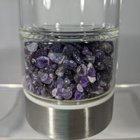 Thumbnail for A glass filled with purple crystals in the Gem Elixir Water Bottle w/ Crystals #X003