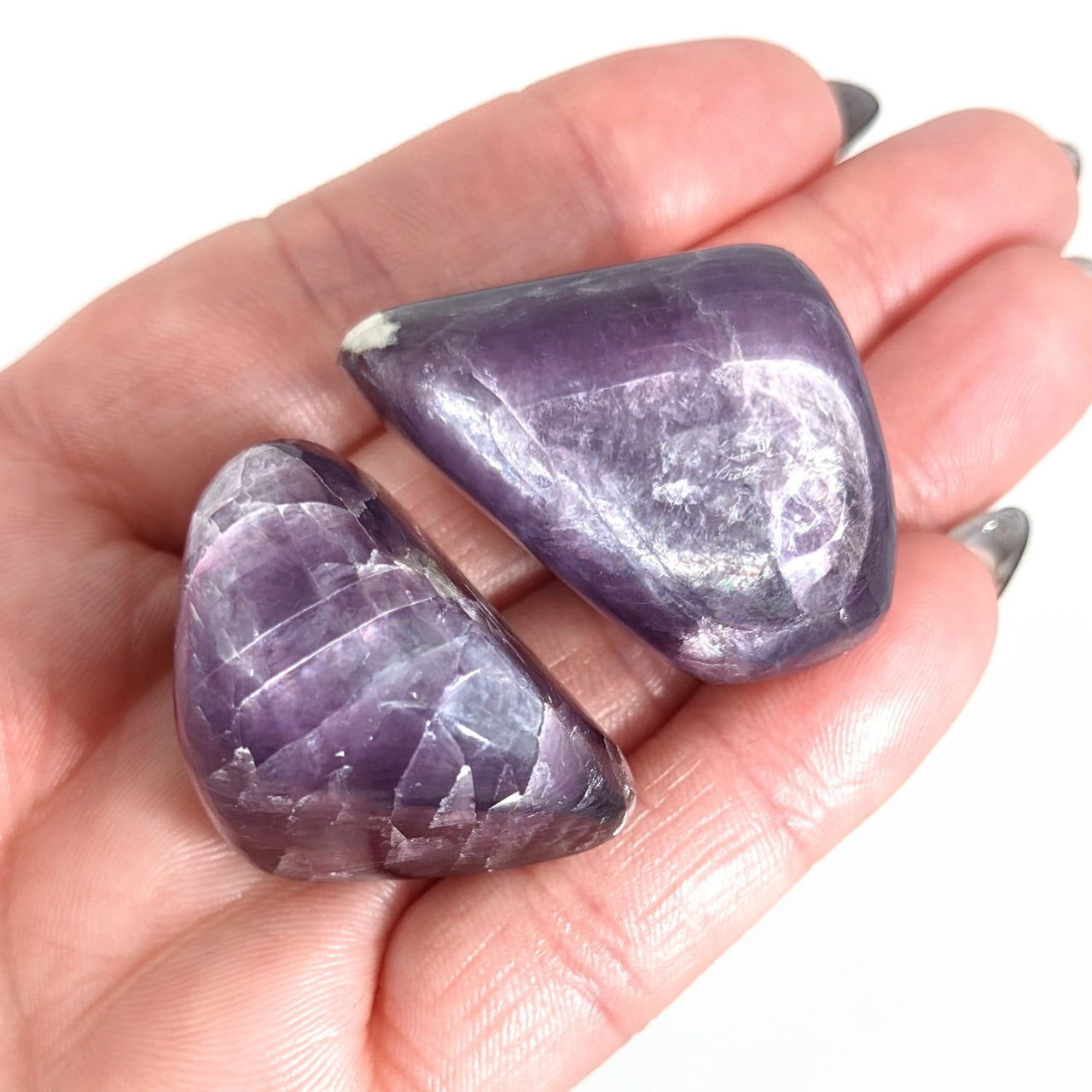 Two amethyst stones in hand - Gem Lepidolite 1.1’ Tumbled Stone #LV1393