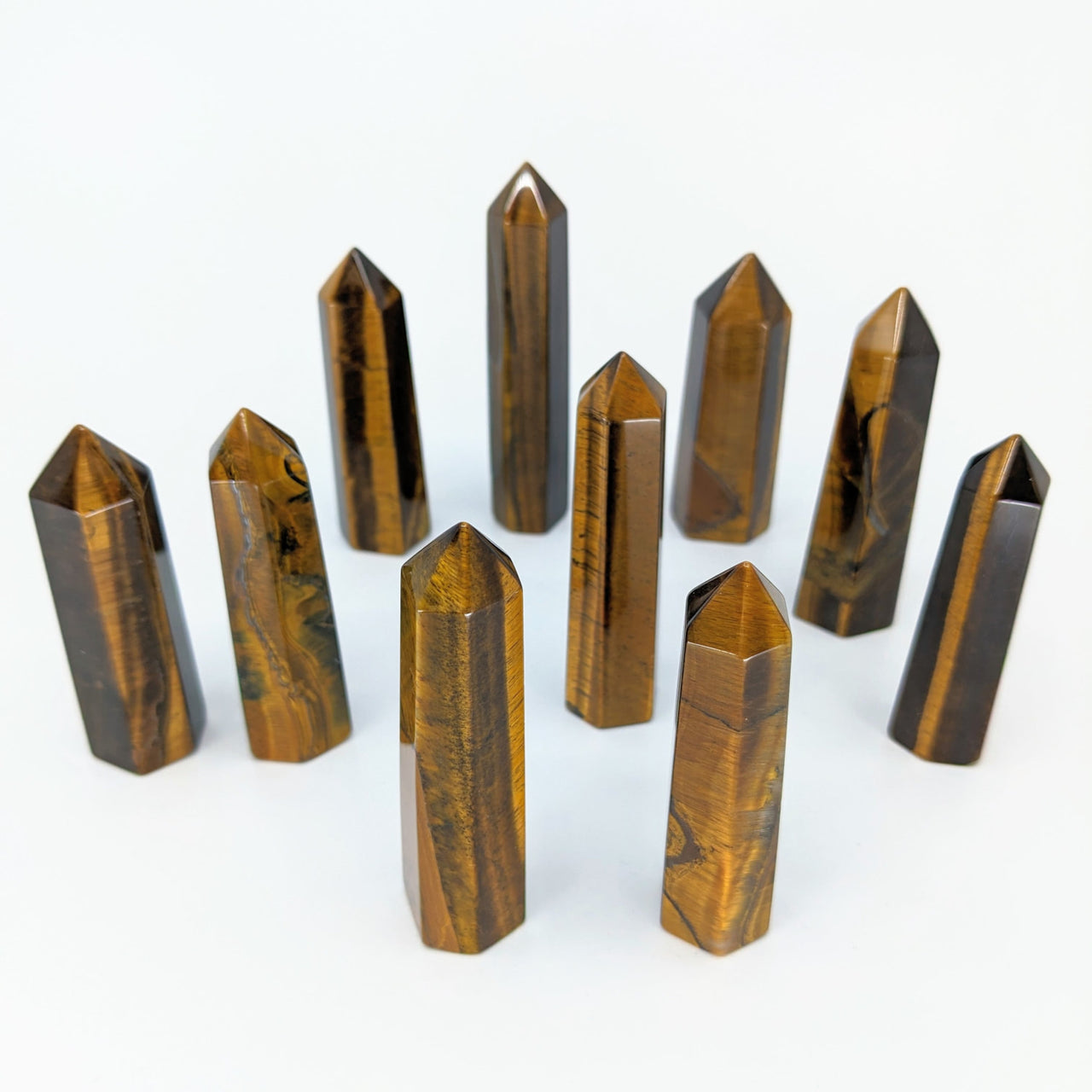 A group of Gold Tiger’s Eye gems in the Gold Tiger’s Eye 3’ Generator #LV2724