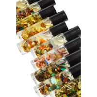 Thumbnail for Small bottles of Good Luck Intention perfume with organic jojoba oil and colorful leaves