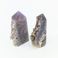 Thumbnail for Two amethyst crystals with a white background - Grape Chalcedony Agate Tower #LV2728