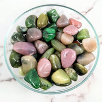 Thumbnail for Tumbled stones: Grossularite Garnet in green and pink in a colorful rock bowl display