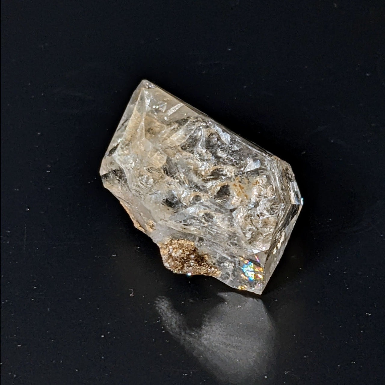 Close-up of Herkimer Diamond #LV4062 showing detailed texture and a smaller rock piece