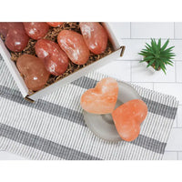 Thumbnail for White bowl with pink Himalayan salt and a heart-shaped Himalayan massage stone