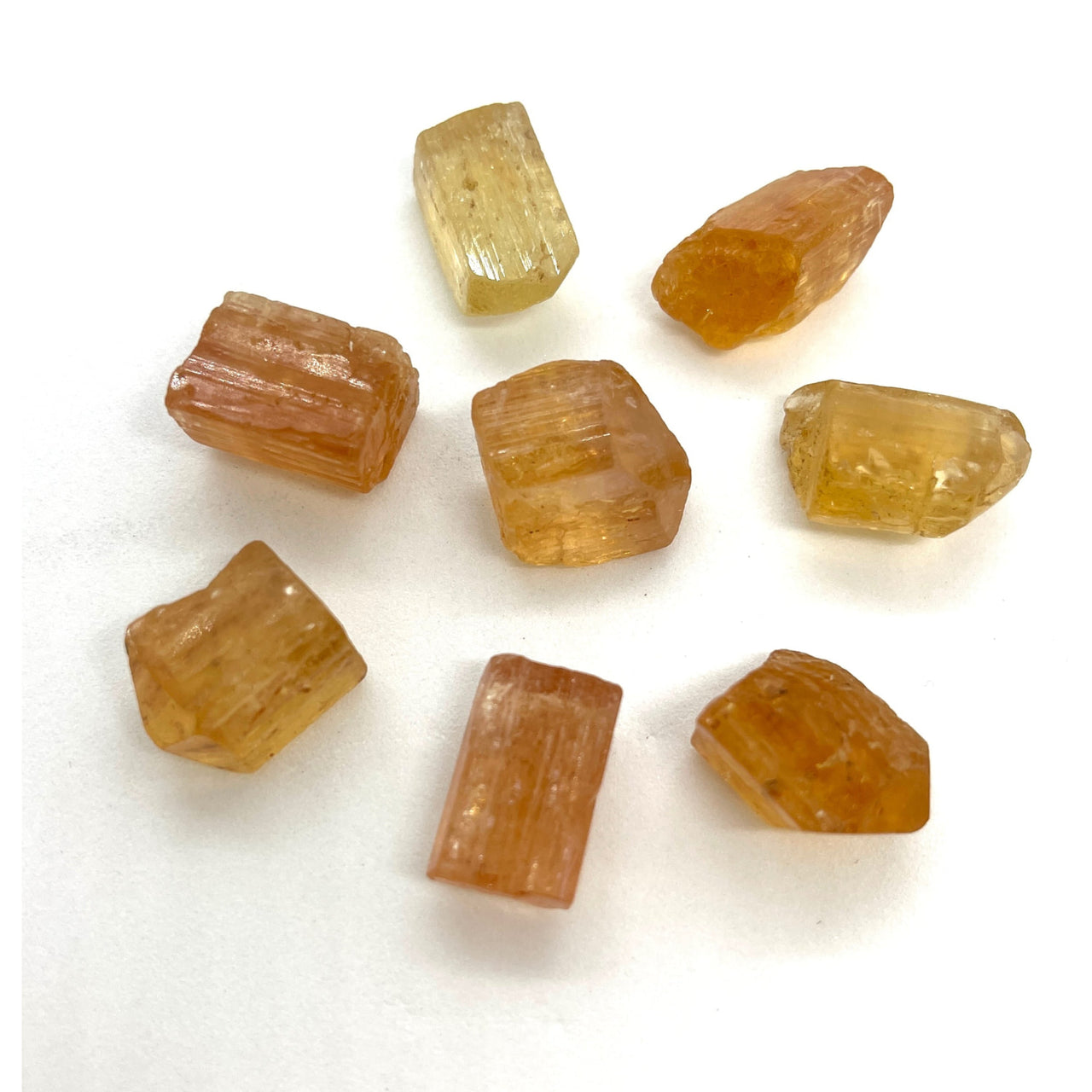 Imperial Golden Topaz Small Rough #DV01 - close up of yellow and brown crystals