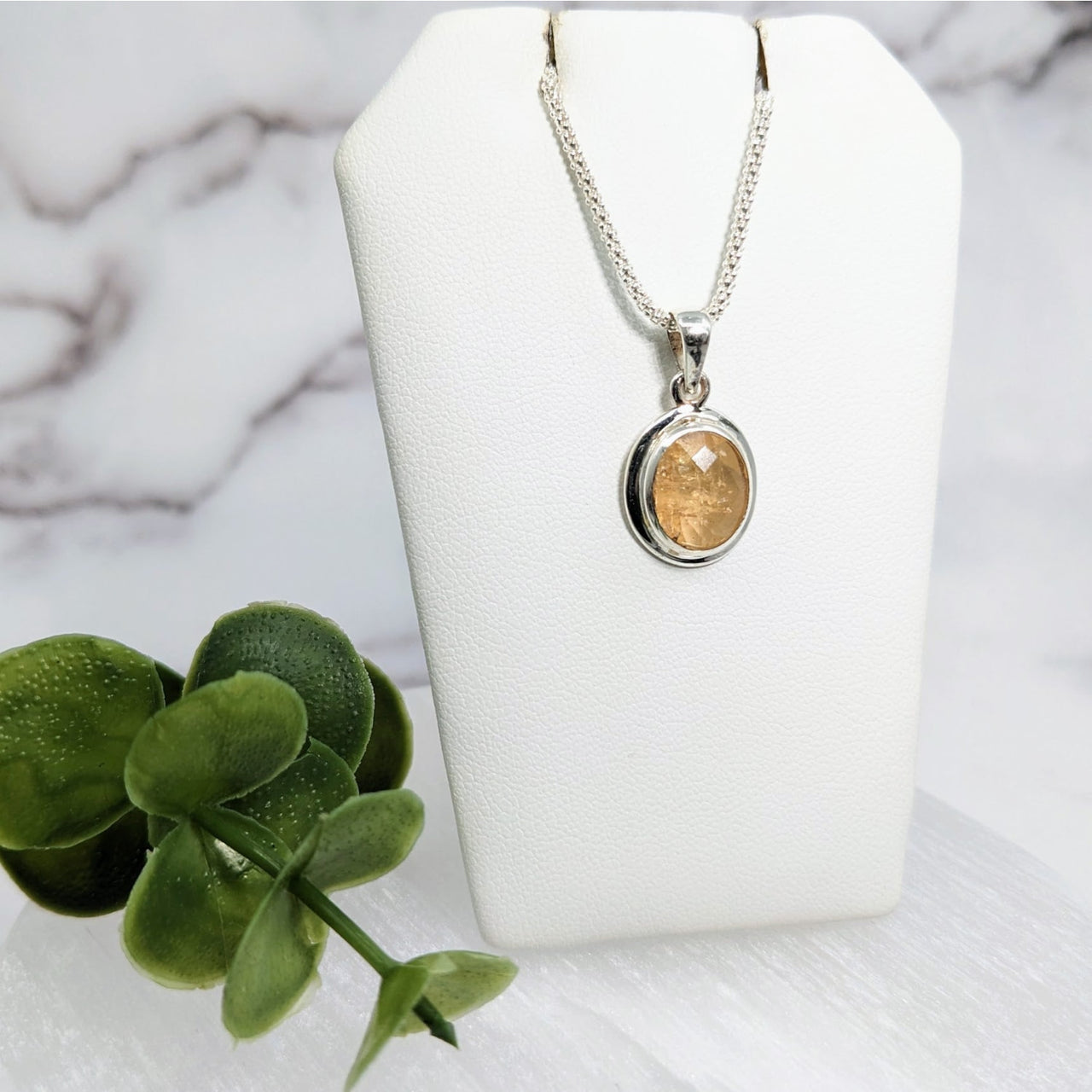 Imperial Topaz gold coin pendant on a white necklace - Product #LV3957