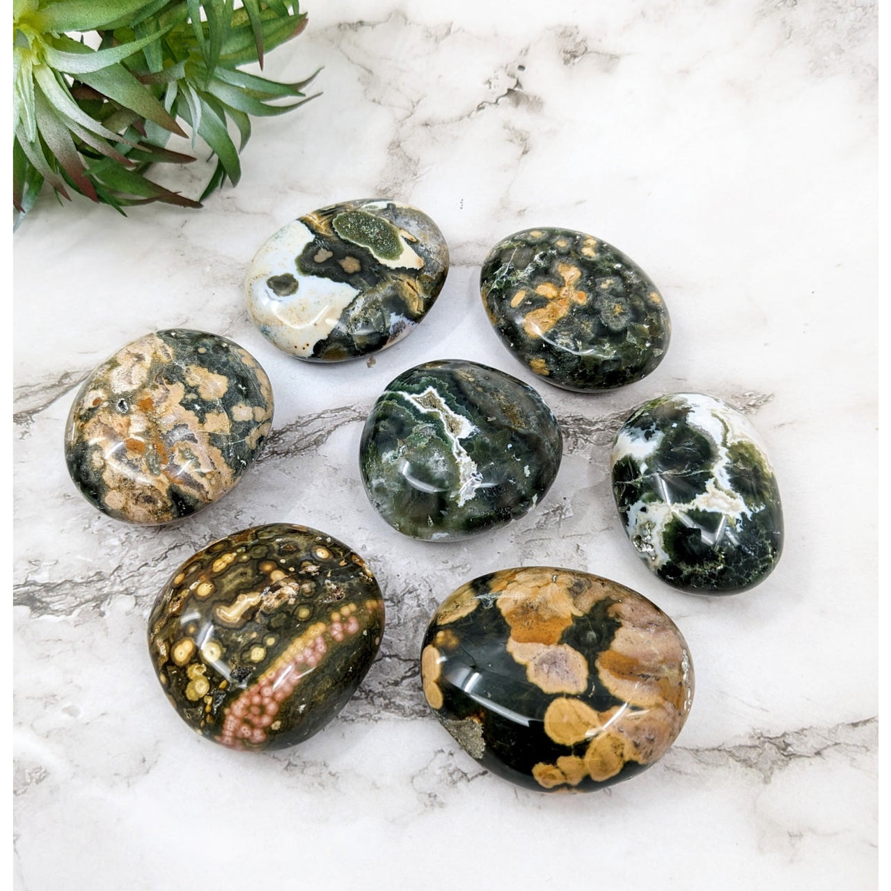 Selection of green and gold Kabamby Ocean Jasper Pebbles 1.9-2.2’ #LV4558 on display