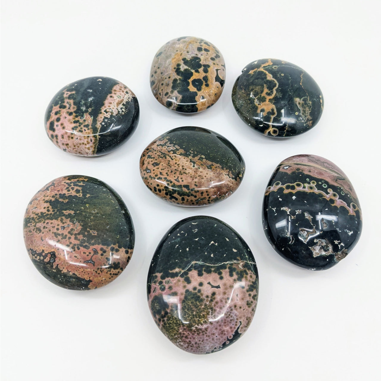 Ocean Jasper Pebble: Six Unique Colored Stones on White Surface - Kabamby Choose Size #LV3167